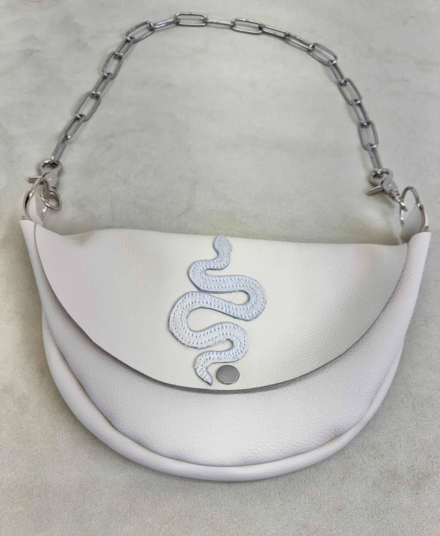 Serpent Half Moon Handbag with Hide Appliqué