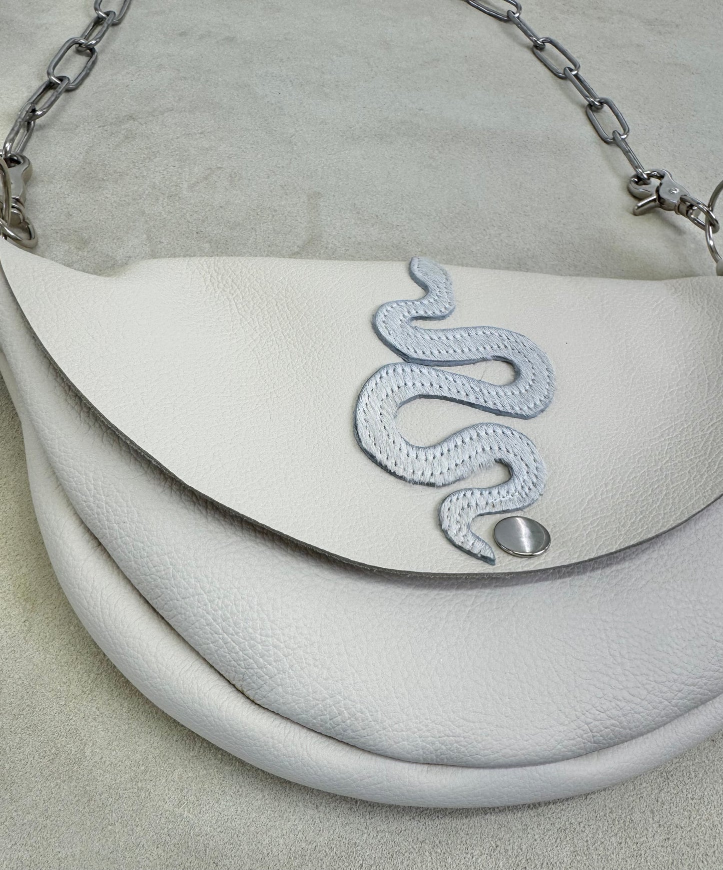 Serpent Half Moon Handbag with Hide Appliqué