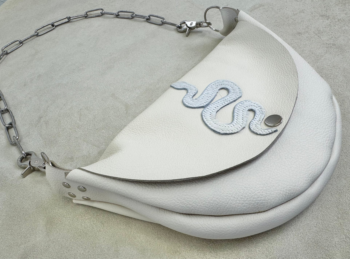 Serpent Half Moon Handbag with Hide Appliqué