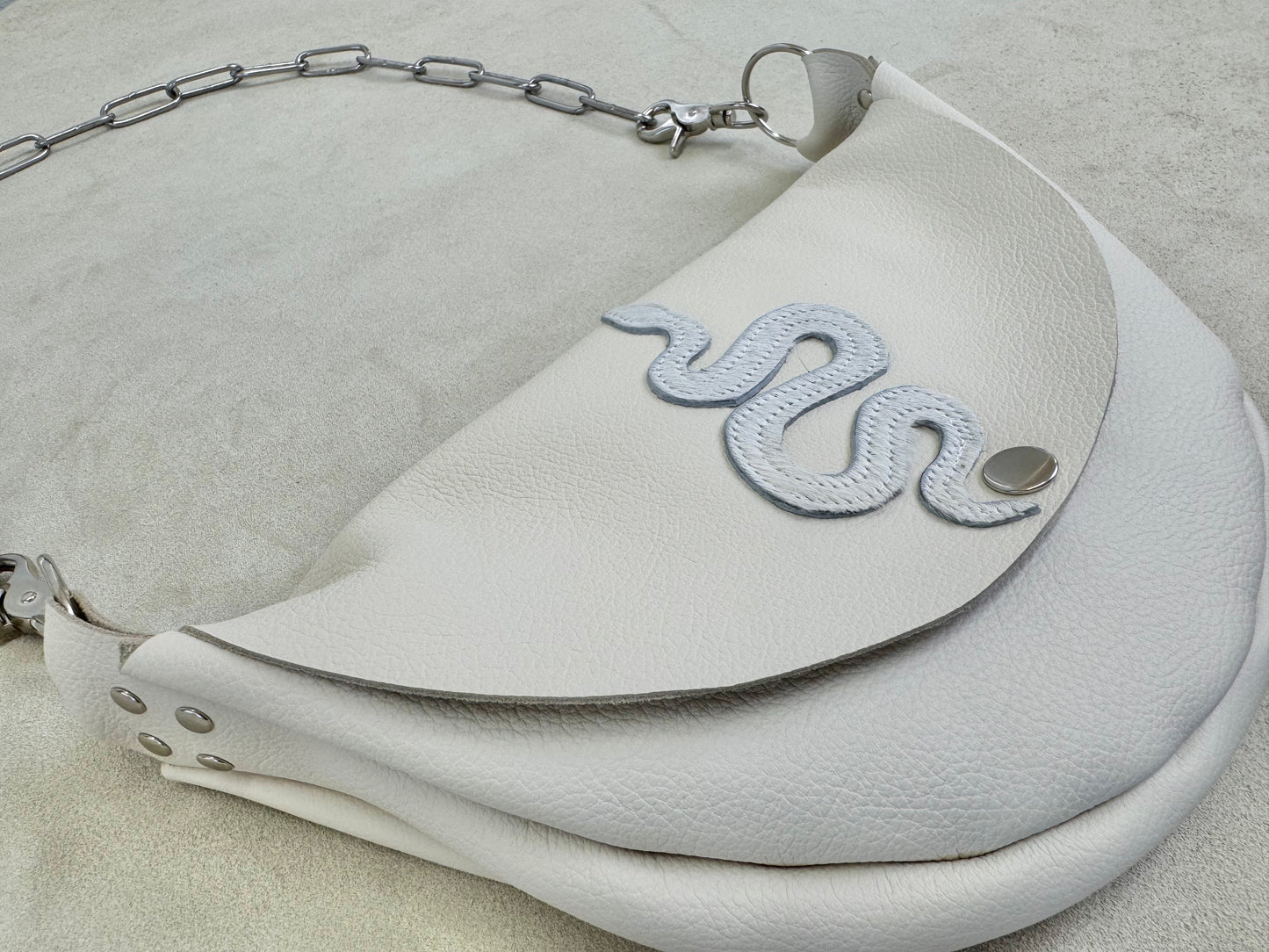 Serpent Half Moon Handbag with Hide Appliqué