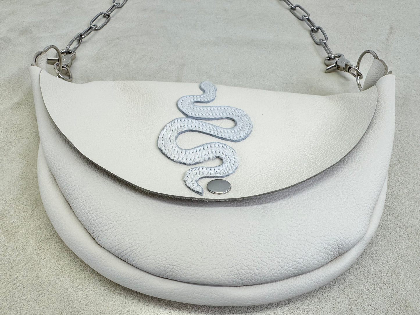 Serpent Half Moon Handbag with Hide Appliqué